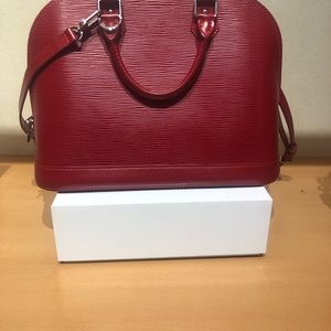 Louis Vuitton Red Alma with adjustable Crossbody